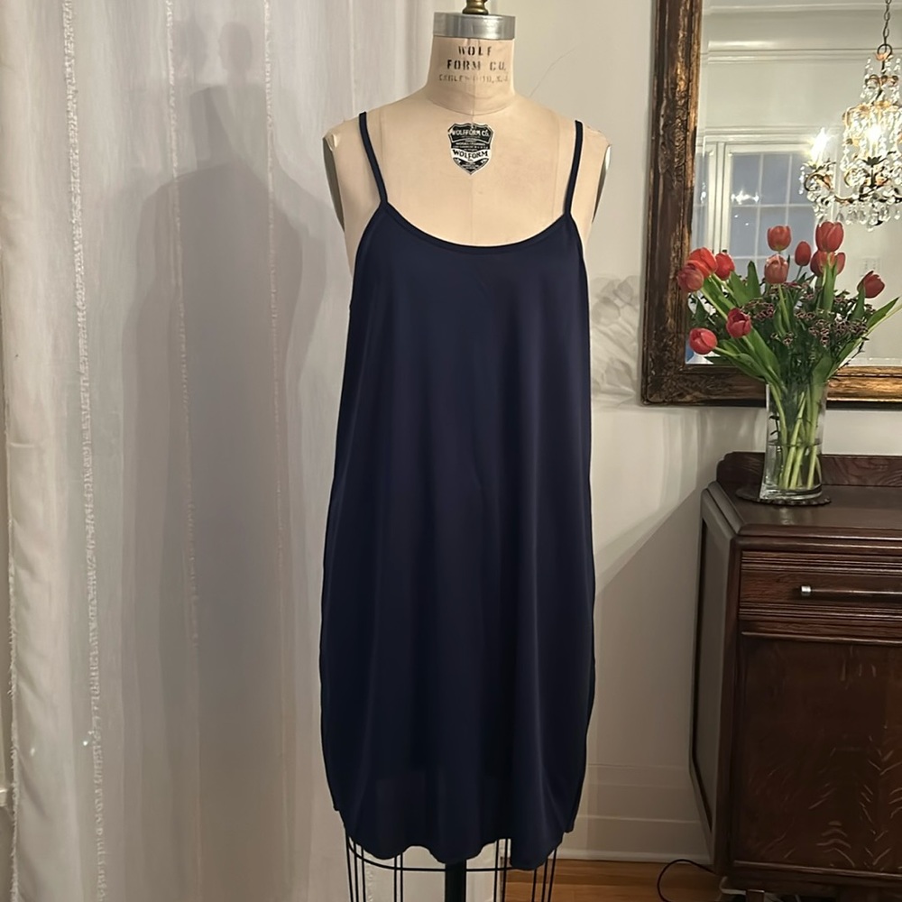 The little navy slip dress in classic navy. Size large.